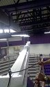 Projector Screen being hung in gym
