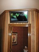 TV mounted above door